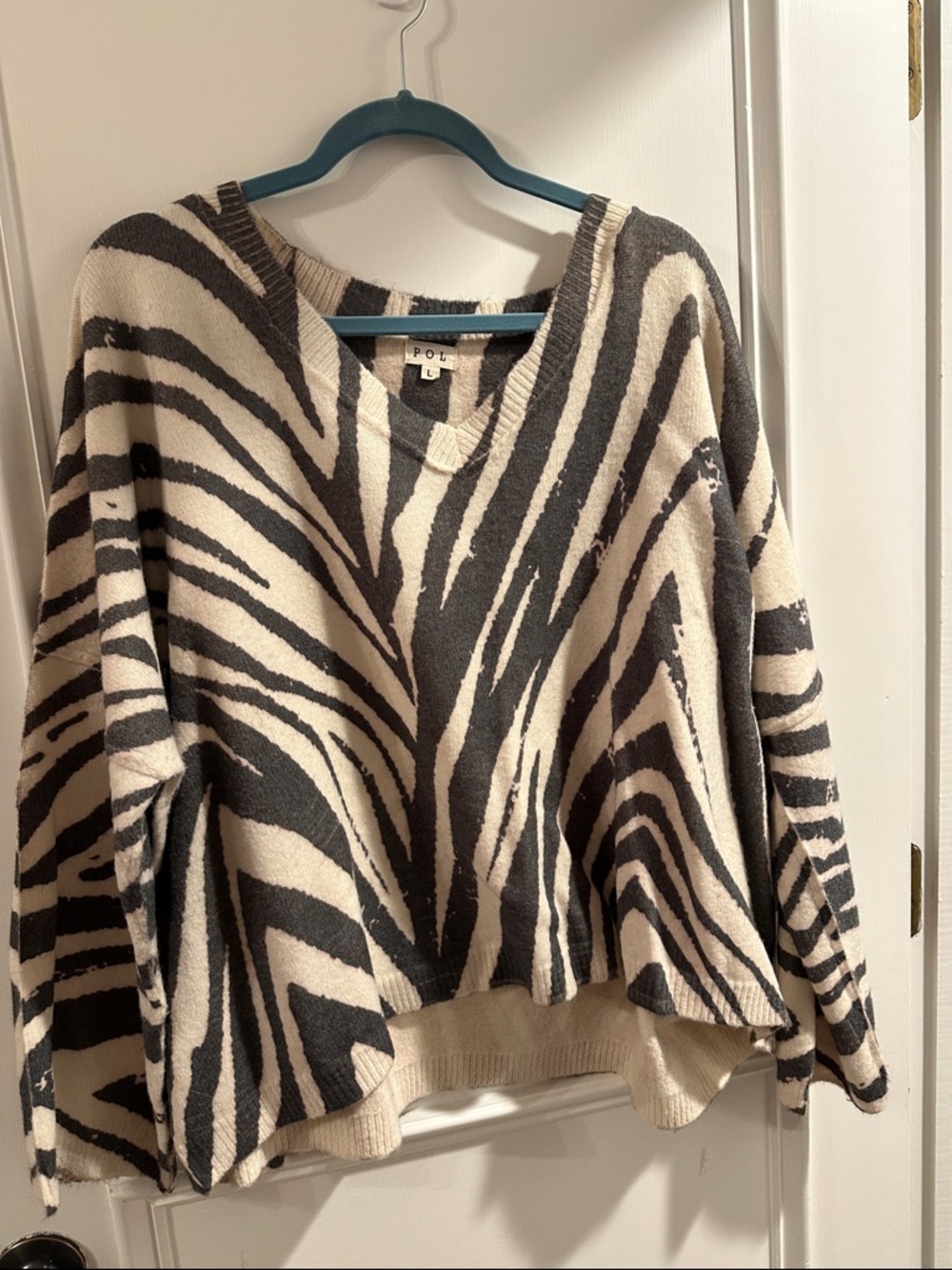 POL Women's Zebra-Print V-Neck Sweater in Black and Cream